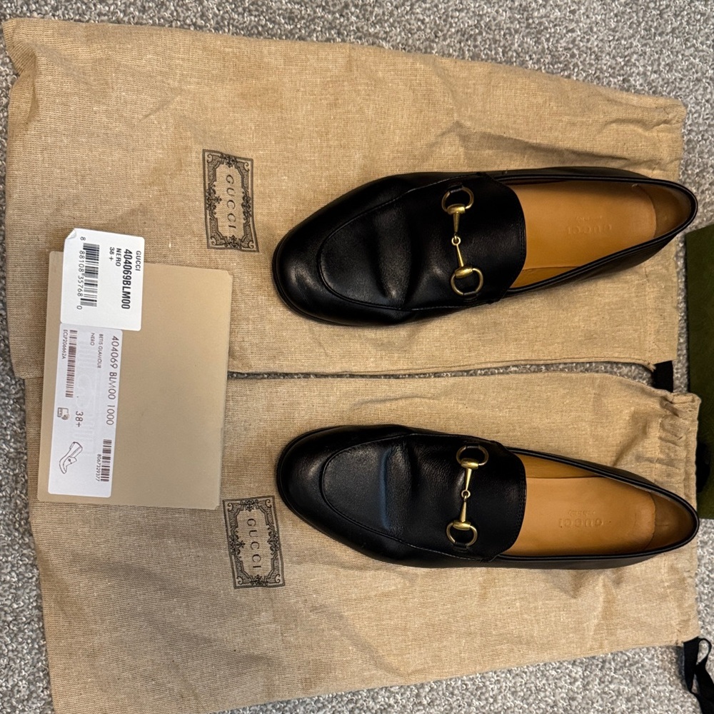 Gucci Black Leather Slip-On Loafers with Gold Accents